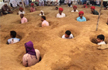 Buried in mud, Rajasthan farmers protest over land compensation